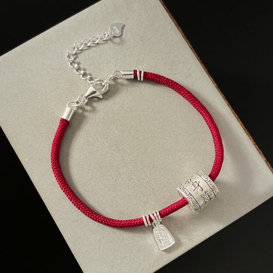 Red String Bracelet with Silver Prosperity Pendant and Talisman